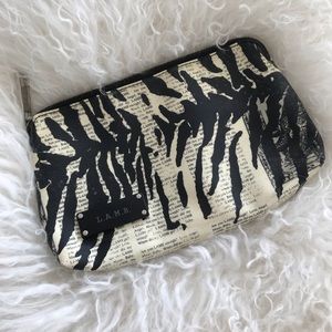 L.A.M.B. Zebra Newsprint Makeup Bag